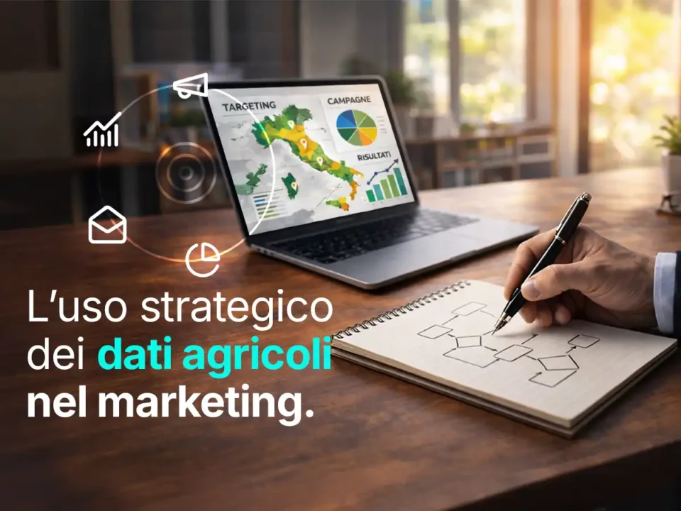 L'uso strategico dei dati agricoli nel marketing. Come usare i dati agricoli per migliorare targeting, DEM e campagne di marketing. Persona in ufficio che guarda il computer, analizza i dati per targeting, campagne e risultati e prende appunti.